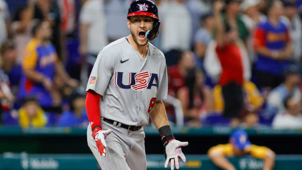 Trea Turner celebrates after hitting a go-ahead grand slam